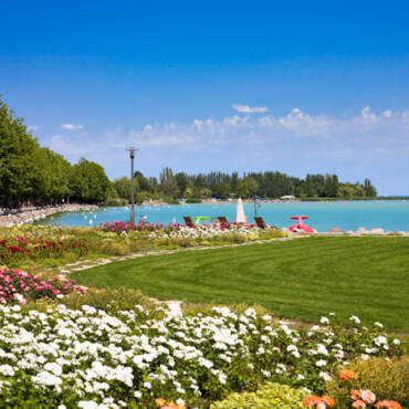 Lake Balaton beach and flower garden at Balatonfured, Hungary.